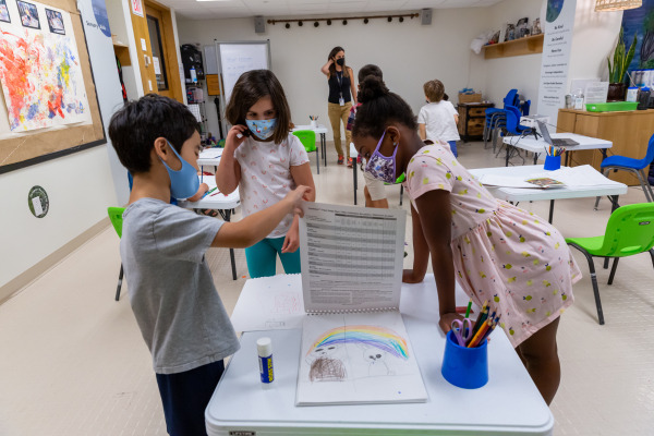 Children receive colorful lessons at the Imagine That science camp
